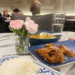 Rice, duck massaman curry, spicy, dressing from raw shrimp salad that was so good I took home bottom of bowl.