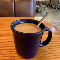 I love coffee served with the spoon in it