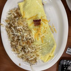 Morgan's Corner Cafe - Bacon and cheese omelette, hash browns. There was toast but I'll be darned if I can remember where it was at the time of this picture!