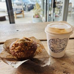 Swift & Finch Coffee - Blueberry muffin and cappuccino.