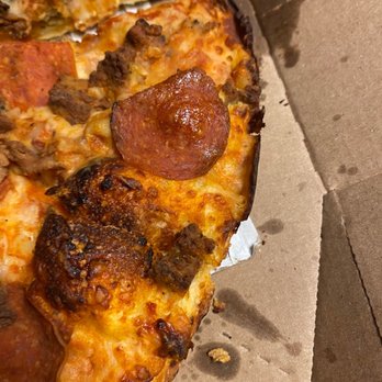Domino's Pizza - a half eaten pizza in a box - Pizza Near Me - Maitland, Florida Domino's Pizza - a half eaten pizza in a box - Pizza Near Me - Maitland, Florida