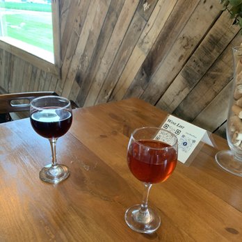Vineyard at Evergreen Farm - Concord grape wine and Rooster Red wine. - Wine Tasting Room Near Me - Coldwater, Ohio Vineyard at Evergreen Farm - Concord grape wine and Rooster Red wine. - Wine Tasting Room Near Me - Coldwater, Ohio