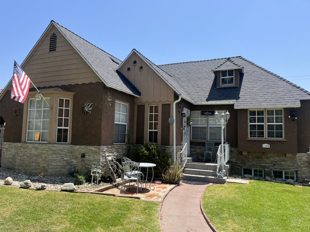 Slide of Goliath Roofing