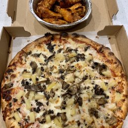Medium mushroom and pineapple pizza with hot wings.