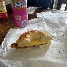 Bacon egg and cheese on a cheese bagel