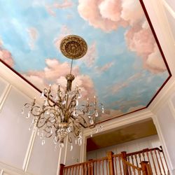 Arteriors - Hand painted blue sky mural on foyer ceiling with pink clouds