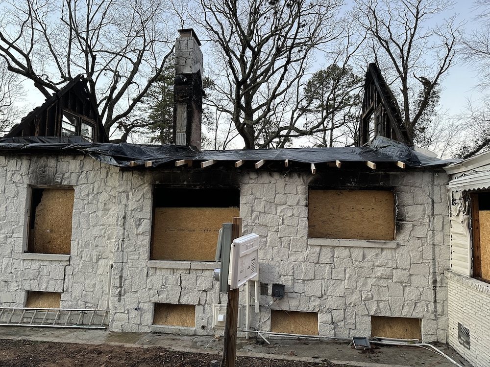 Slide of KM Roof and Home Repair