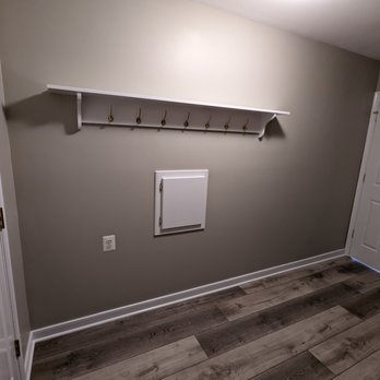 Kruper Flooring & Design - a hallway with a coat rack - Flooring Near Me Kruper Flooring & Design - a hallway with a coat rack - Flooring Near Me