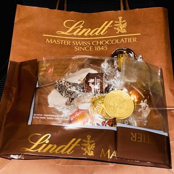 Lindt Chocolate Shop - The little bag they put your candy in before giving you a bag bag to carry out - Candy Stores Near Me - Arlington, Virginia Lindt Chocolate Shop - The little bag they put your candy in before giving you a bag bag to carry out - Candy Stores Near Me - Arlington, Virginia