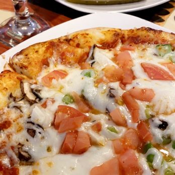 George The Greek - Stone baked pizza - Greek Near Me - Elliot Lake, Ontario George The Greek - Stone baked pizza - Greek Near Me - Elliot Lake, Ontario