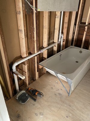 The in and out plumbing guy Logo