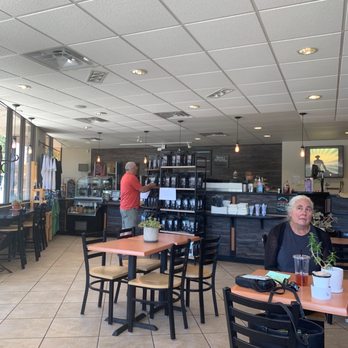 Matador Coffee - Seating near the windows looking back at serving area - Coffee & Tea Near Me - Flagstaff, Arizona Matador Coffee - Seating near the windows looking back at serving area - Coffee & Tea Near Me - Flagstaff, Arizona
