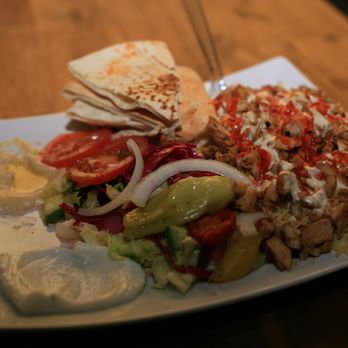 Baraka Shawarma - a plate of food on a table - Halal Near Me - St. Catharines, Ontario Baraka Shawarma - a plate of food on a table - Halal Near Me - St. Catharines, Ontario