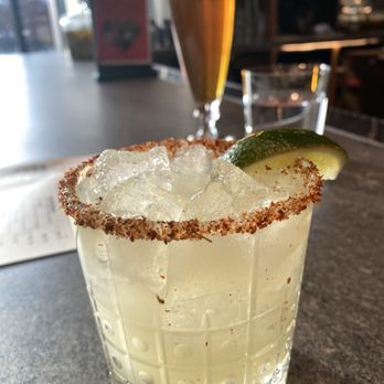 Immigrant Food Ballston - Mezcal margarita with tajín rim - New American Near Me - Arlington, Virginia Immigrant Food Ballston - Mezcal margarita with tajín rim - New American Near Me - Arlington, Virginia