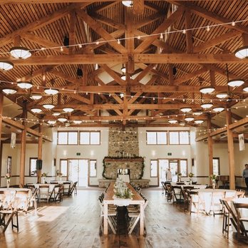 Caley's Catering and Events - Inside of the venue with the lighting, speakers, tables, chairs and linen set up by Caley's - Caterers Near Me