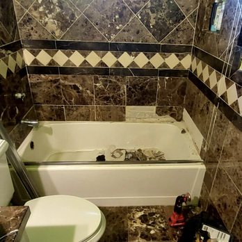 Ramos Painting and Remodeling - a tiled bathroom - Painters Near Me Ramos Painting and Remodeling - a tiled bathroom - Painters Near Me