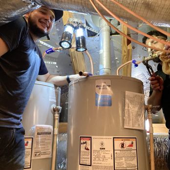 New Gen Plumbing - Felix and Juan working in the attic - Plumbing Near Me - Spring, Texas New Gen Plumbing - Felix and Juan working in the attic - Plumbing Near Me - Spring, Texas