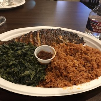 African Village Restaurant - Grilled tilapia, greens and jollof rice. Plantain was my appetizer but I couldn't eat everything. Food was awesome. I'm so stuffed! - African Near Me - Irving, Texas African Village Restaurant - Grilled tilapia, greens and jollof rice. Plantain was my appetizer but I couldn't eat everything. Food was awesome. I'm so stuffed! - African Near Me - Irving, Texas