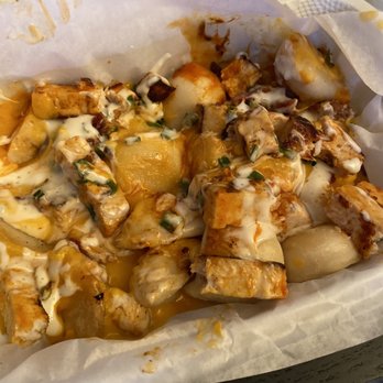 Thirsty Rhino - Spicy chicken perogies...so good - Bars Near Me - Edmonton, Alberta