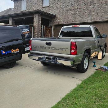 Dynodent Paintless Dent Repair - Mobile service working on clients vehicle in their home driveway. - Mobile Dent Repair Near Me - Addison, Texas Dynodent Paintless Dent Repair - Mobile service working on clients vehicle in their home driveway. - Mobile Dent Repair Near Me - Addison, Texas