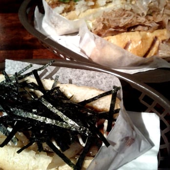 Japadog - Front, Kurobuta Terimayo. Middle, Okonomi. Back, Oroshi. - Japanese Near Me - Vancouver, British Columbia Japadog - Front, Kurobuta Terimayo. Middle, Okonomi. Back, Oroshi. - Japanese Near Me - Vancouver, British Columbia