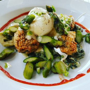 Cowfish - Egg benetic with fried oysters and veggies - New American Near Me - Hampton Bays, New York