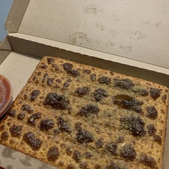 Pizza Hut - a pizza in a box with a side of ketchup - Pizza Near Me - Raymore, Missouri