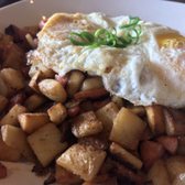 Photo of Moena Café - Honolulu, HI, United States. Pineapple sausage hash