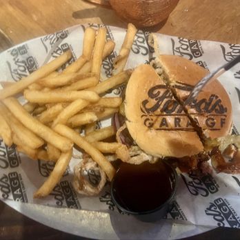 Ford's Garage Estero - Roadster - 1/3 lb angus burger with pulled Pork, onion straws, sliced red onion and a side Of Ford's Signature Fries - Bars Near Me - Estero, Florida