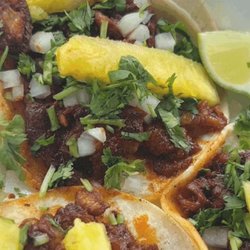 El Homiez Taco - Amazing Al Pastor Taco with Pineapple and spicy pineapple sauce.