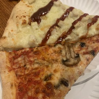 Nick's Tomato Pie - two slices of pizza on a paper plate - Pizza Near Me - Syracuse, New York Nick's Tomato Pie - two slices of pizza on a paper plate - Pizza Near Me - Syracuse, New York