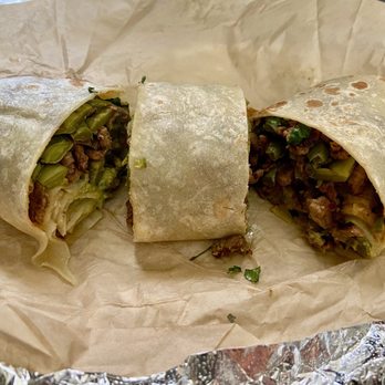 Alvarado’s Mexican Grill - Alvarado burrito showing fillings inside - Mexican Near Me - Pomona, California Alvarado’s Mexican Grill - Alvarado burrito showing fillings inside - Mexican Near Me - Pomona, California