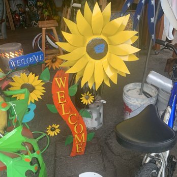 Traders Village - Sunflower welcome metal decor I t does spin when is windy. - Flea Markets Near Me - Grand Prairie, Texas Traders Village - Sunflower welcome metal decor I t does spin when is windy. - Flea Markets Near Me - Grand Prairie, Texas