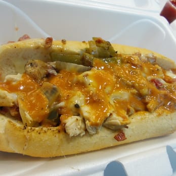 In-Law Subs - a hot dog in a styrofoam container - Food Trucks Near Me