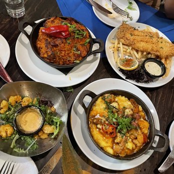 French Quarter - Top left - creole jambalaya Top right - fish and chips Bottom left -popcorn shrimp Bottom right - creole shrimp and grits - Bars Near Me - Boston, Massachusetts French Quarter - Top left - creole jambalaya Top right - fish and chips Bottom left -popcorn shrimp Bottom right - creole shrimp and grits - Bars Near Me - Boston, Massachusetts