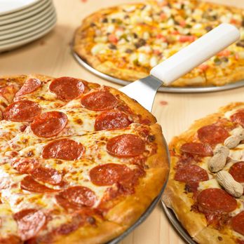 D & M Pizza - three pizzas on a table - Pizza Near Me - Attleboro, Massachusetts D & M Pizza - three pizzas on a table - Pizza Near Me - Attleboro, Massachusetts