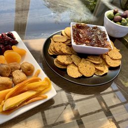 Small plates: dried fruit, goat cheese dip and olives. Small plates: dried fruit, goat cheese dip and olives.