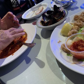 Casa Calamari - Mussels Fra Diavolo & Calamari Fritti with picante fresh garlic sauce - Italian Near Me - Surfside Beach, South Carolina