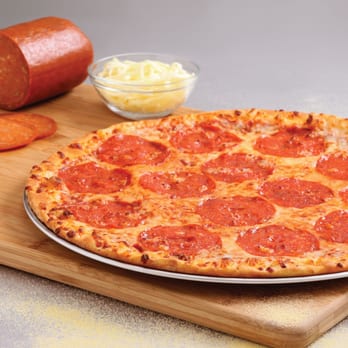 Domino's Pizza - a pepperoni pizza on a cutting board - Pizza Near Me - Longueuil, Quebec Domino's Pizza - a pepperoni pizza on a cutting board - Pizza Near Me - Longueuil, Quebec