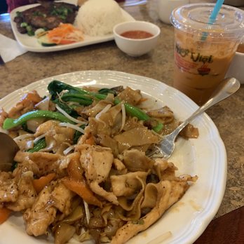 Pho Viet - Hu tieu xao hit ga ($11), or thick stir-fried rice noodles with chicken and veggies + thai iced tea ($4) in the background - Vietnamese Near Me - Philadelphia, Pennsylvania Pho Viet - Hu tieu xao hit ga ($11), or thick stir-fried rice noodles with chicken and veggies + thai iced tea ($4) in the background - Vietnamese Near Me - Philadelphia, Pennsylvania