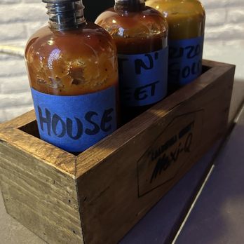 Caldwell County Mexi-Q - BBQ sauce options at the table - Barbeque Near Me - Gilbert, Arizona