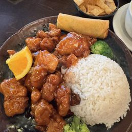 Orange chicken lunch special with white rice. Orange chicken lunch special with white rice.