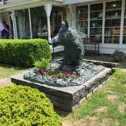 Gilded Carriage - Statue in front of store.