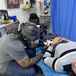 Village Moon Tattoo & Body Piercing