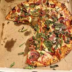 Old Dominion Pizza - Partially eaten 16" The General.