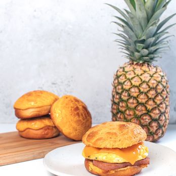 Cafe Aloe - Fluffy eggs, cheese and spam (or sausage patty) in a sweet and crispy pineapple bun. - Cafes Near Me - Bellevue, Washington