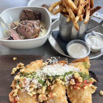 1909 - TOP: Potato Gnocchi with Steak, House Fries with Bacon Infused Salt BOTTOM: Crab & Shrimp Empanadas - Bars Near Me - Temecula, California 1909 - TOP: Potato Gnocchi with Steak, House Fries with Bacon Infused Salt BOTTOM: Crab & Shrimp Empanadas - Bars Near Me - Temecula, California