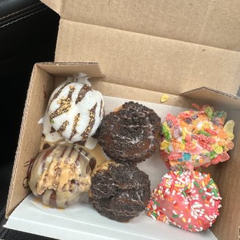 Donut Distillery - Chocolate, s'mores, fruity pebbles, strawberry icing with sprinkles, Reese's - Donuts Near Me - Nashville, Tennessee