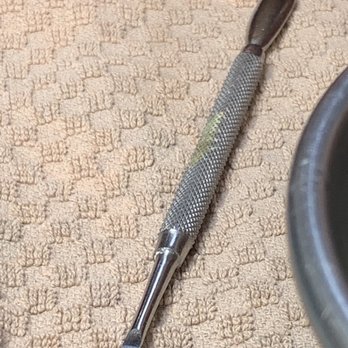 Mimi Nails - I'm not even sure what is on this tool. It's green/ yellow and it's obvious that they do not have any regard for health and hygiene. - Nail Salons Near Me - Broomfield, Colorado