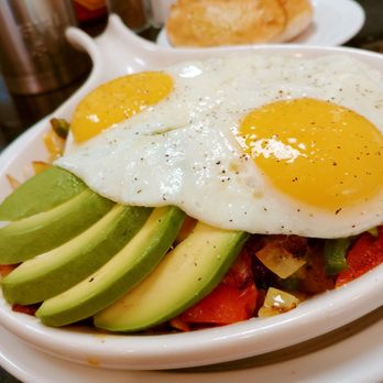 Cinnamon Pancake House - Tijuana Skillet has al pastor, tomato, onion, jalapeno, avocado and jack cheese blend. ©hungryhaus - Breakfast & Brunch Near Me - Naperville, Illinois